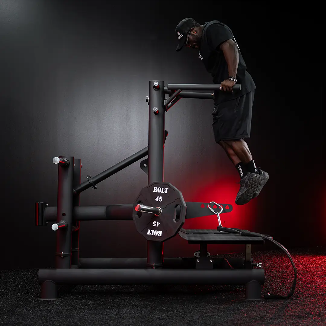 Terrence Ruffin working out on the Tomahawk belt squat using the retractable dip station..